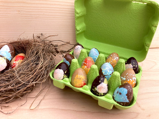 Cocos de cailles en chocolat garnis de ganache et de praliné